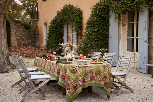 Jardin red and green French tablecloth styled on a table, hand block-printed cotton